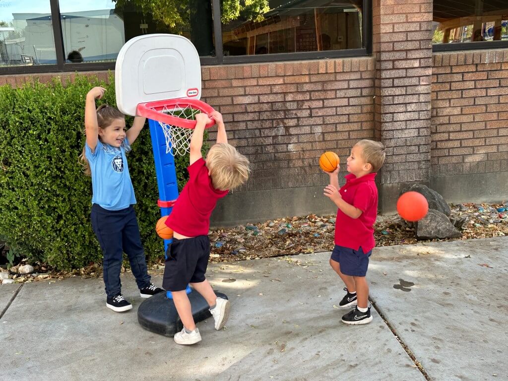 Students playing football during athletic activities